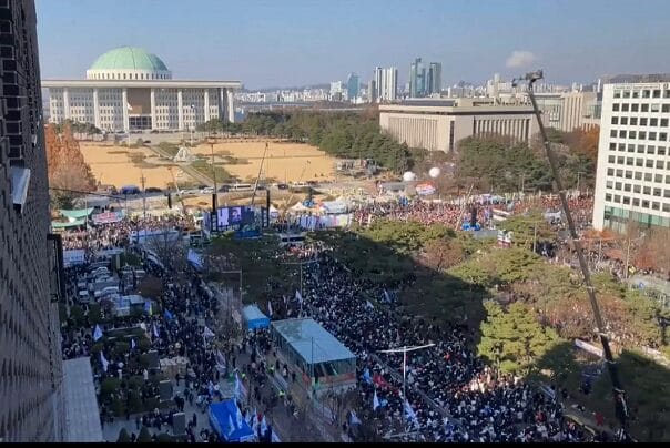 South Korea MPs vote to impeach president after mass protests over martial law